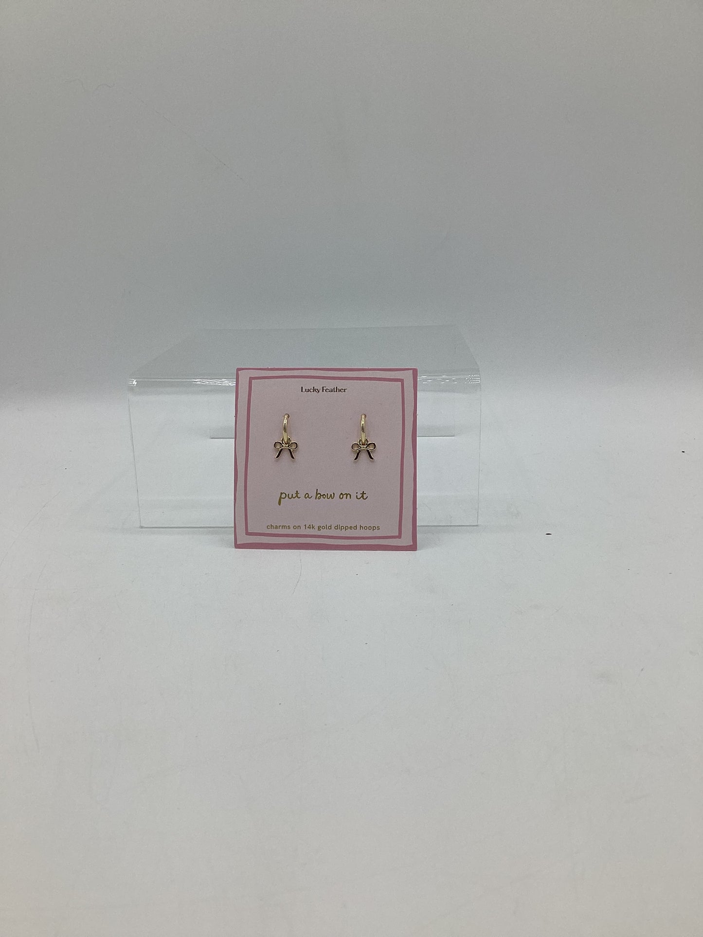 Gold bow earrings-Lucky feather