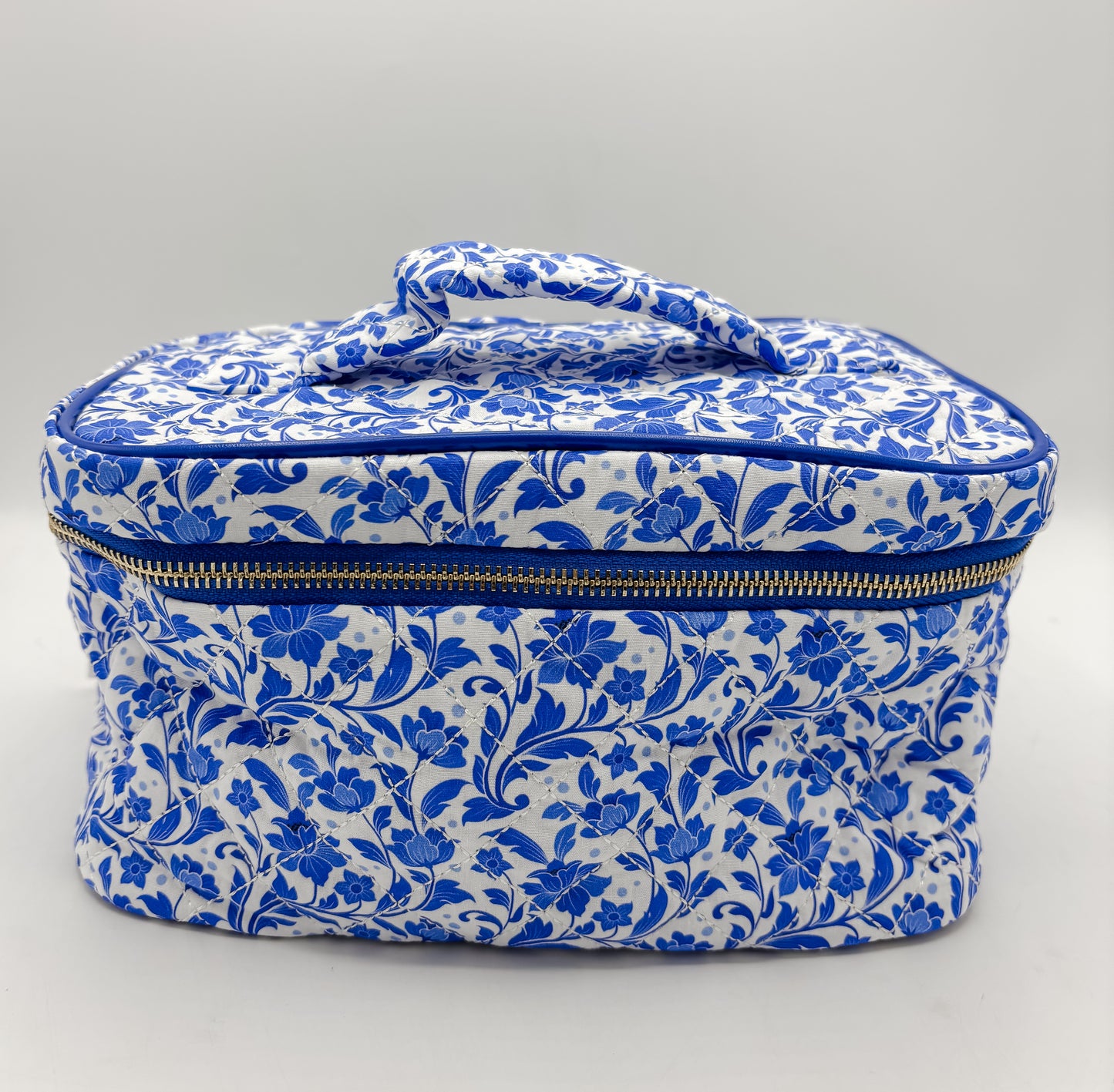 blue floral vanity bag